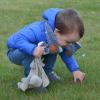 child interacting with his environment, developing their perceptual motor skills